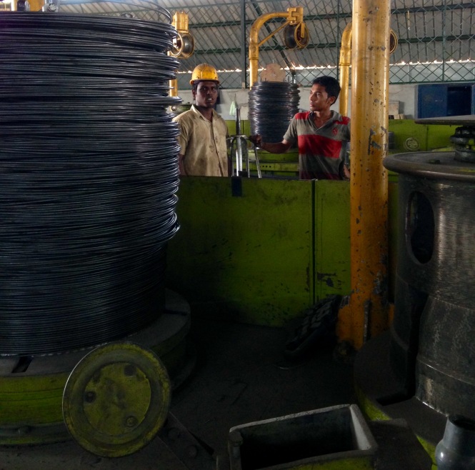 Workers at a new factory in the revamped Atchuvely Industrial Zone, Jaffna, Northern Sri Lanka. The 25-acre facility, built with Indian aid, has slowly begun to attract new investors from the region.